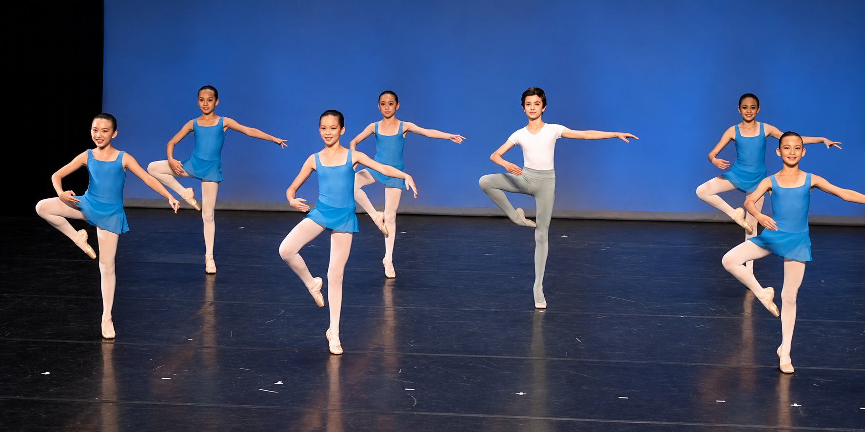 Groupe de danseurs en équilibre sur une demi-pointe
